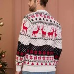 Rear view of a man wearing a white, red, and black fair isle knit sweater near a Christmas tree.