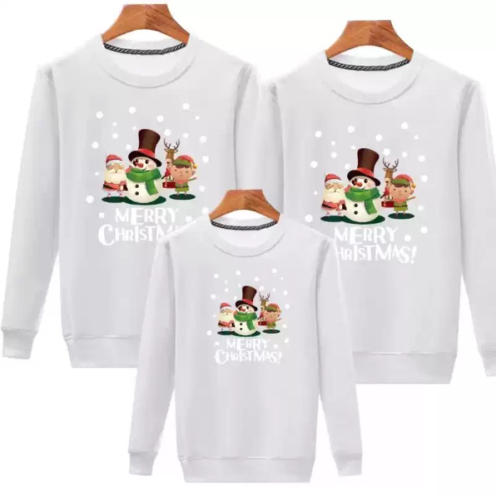 white-family-christmas-sweatshirts.webp Black matching family Christmas sweatshirts with Santa and snowman design.