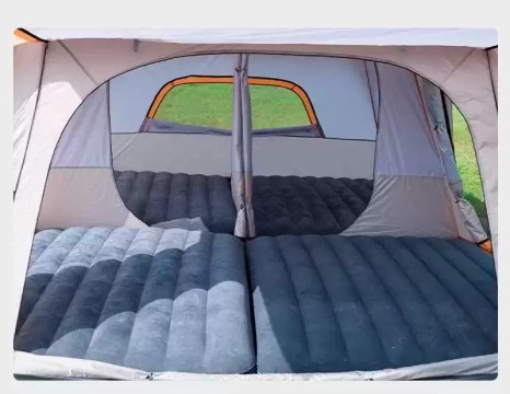 Family camping tent interior with large sleeping area for 4–6 people