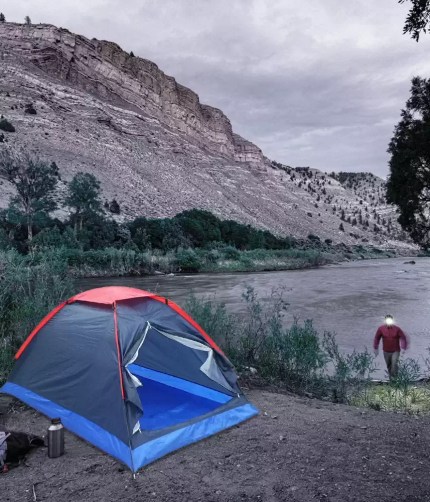 Interior view showing the massive large space and standing room of the Oxford cloth tunnel tent.