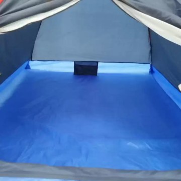 Waterproof sewn-in groundsheet inside a compact dome camping tent for UK weather