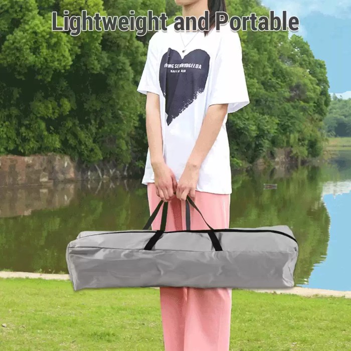 he instant pop up tent folded into its circular travel carry bag.