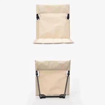 Folding camping chair backrest shown flat and assembled