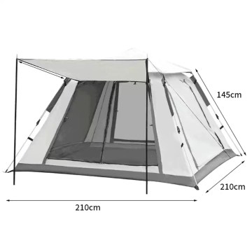 Spacious interior of a pop-up family tent with storage pockets and a lantern hook for comfortable motorhome awning use.