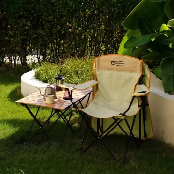 Folding camping chair with side table, perfect for garden and outdoor relaxing