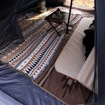 Spacious tent interior with sleeping mat and camping rug, comfortable setup for UK camping