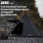 A large grey octagon pyramid tent set up in a forest clearing for camping.