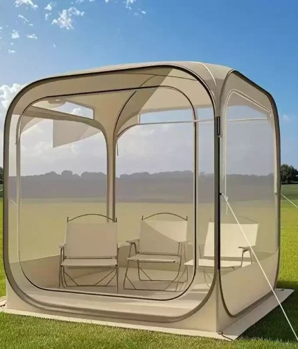 Interior view of the 360 panoramic view tent showing a luxury bed and pillows.