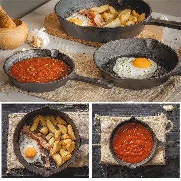 Small cast iron skillet cooking egg and tomato sauce, perfect for campsite breakfast cooking UK.