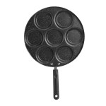 Close-up of the non-stick surface on a 7-hole burger and egg mould.