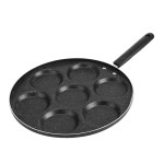 Underside of the pan showing the composite base for even heat distribution.