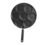 7-hole frying pan being used to prepare breakfast burgers and sliders.