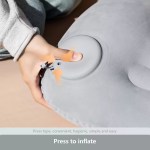 Portable air sleeping pillow by FJK Camping Gear with lumbar support.
