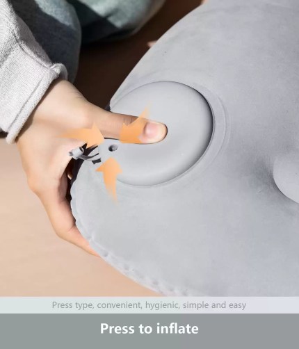 Portable air sleeping pillow by FJK Camping Gear with lumbar support.