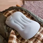 FJK Camping Gear inflatable hiking pillow for ultralight backpacking.