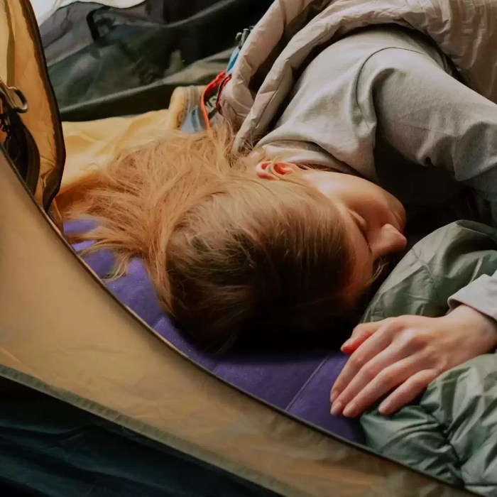 FJK Camping Gear inflatable pillow being used for lumbar support in an office.
