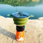 Non-stick foldable portable camping cook pot with a heat-resistant silicone body for UK caravan travel.