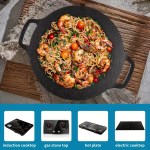 Lightweight outdoor cooking griddle with a heat-resistant handle for motorhome and campervan kitchens.