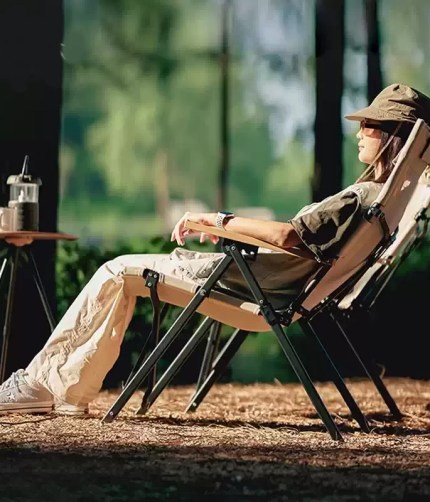 Hispeed camping adjustable portable chair in a reclining lying position.
