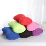 Lightweight and compact camping bolster cushion designed to fit easily into travel luggage and rucksacks.
