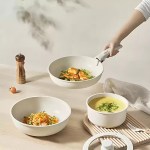 Easy-clean marble-effect campsite cooking pot for quick washing at outdoor facilities.