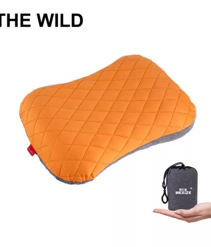 Portable inflatable pillow in a blue contoured travel design.