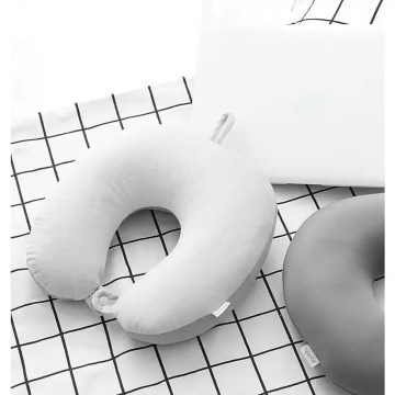 Soft white U-shape travel pillow, compact neck support for UK camping