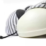 Compressible portable travel pillow that fits into compact camping rucksacks and carry-on luggage.