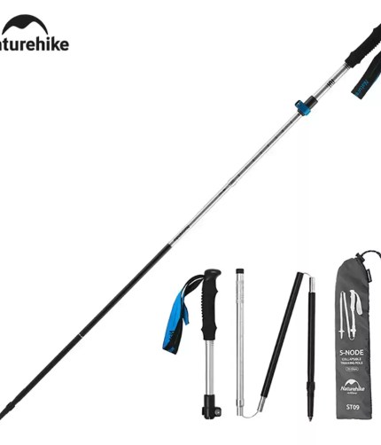 Naturehike folding trekking poles in use on a rugged trail in the Scottish Highlands.