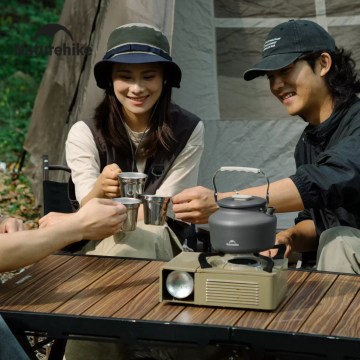 UK camping kettle set used outdoors with portable stove and cups