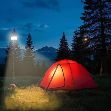LED camping tripod light illuminating tent, portable floodlight for UK camping