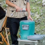 Square-shaped camping water container for stable storage at UK campsites.