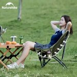 Ergonomic high-back folding camping chair support.