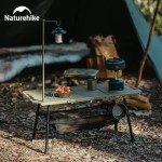 Naturehike IGT camping table with integrated black lantern pole attachment.