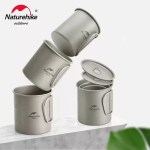 Space-saving nesting titanium cups designed for compact backpacking storage in UK.