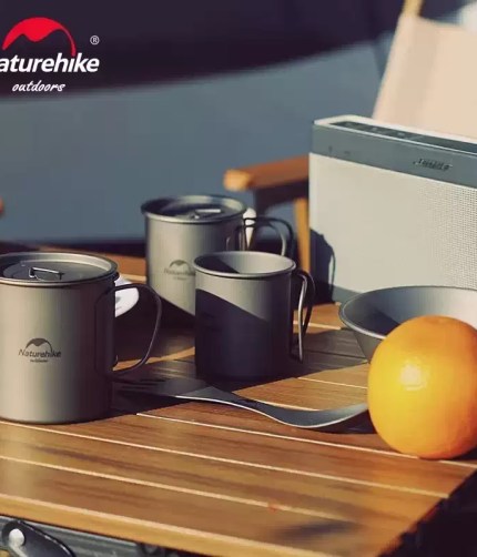 Naturehike titanium cup set being used for morning coffee at UK campsite.