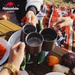 Precision-fit titanium cup lid with steam vents for efficient outdoor boiling.