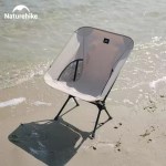 Naturehike ultralight folding camping chair in black with durable aluminum frame.
