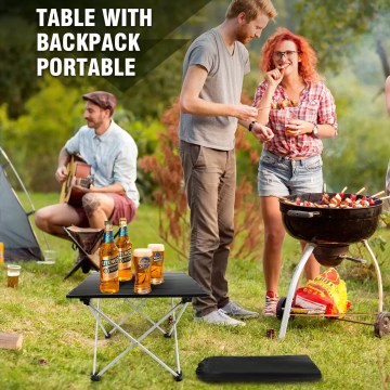 Mini portable camping table set up in a UK woodland setting.