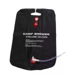Portable 20L solar shower bag hanging for a UK forest campsite.