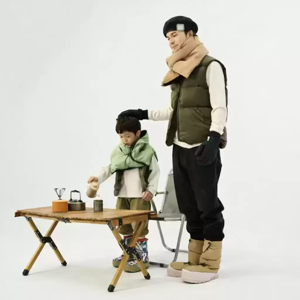 family outdoor setup using warm goose down neck cover cold weather camping gear