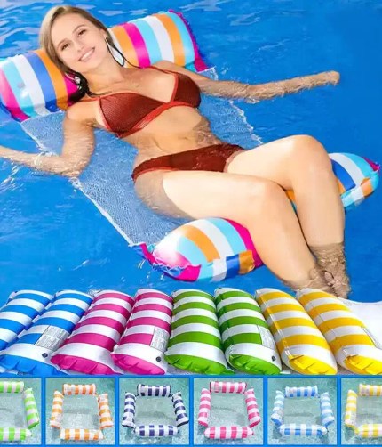 Woman relaxing on a colourful striped inflatable pool hammock.