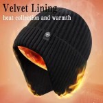 Black winter knit beanie featuring a soft velvet and plush lining designed for heat collection and warmth