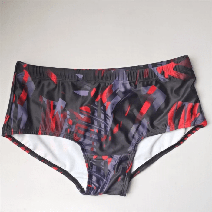 Men's Brazilian traditional cut swim trunks with lightweight quick-dry camouflage design.