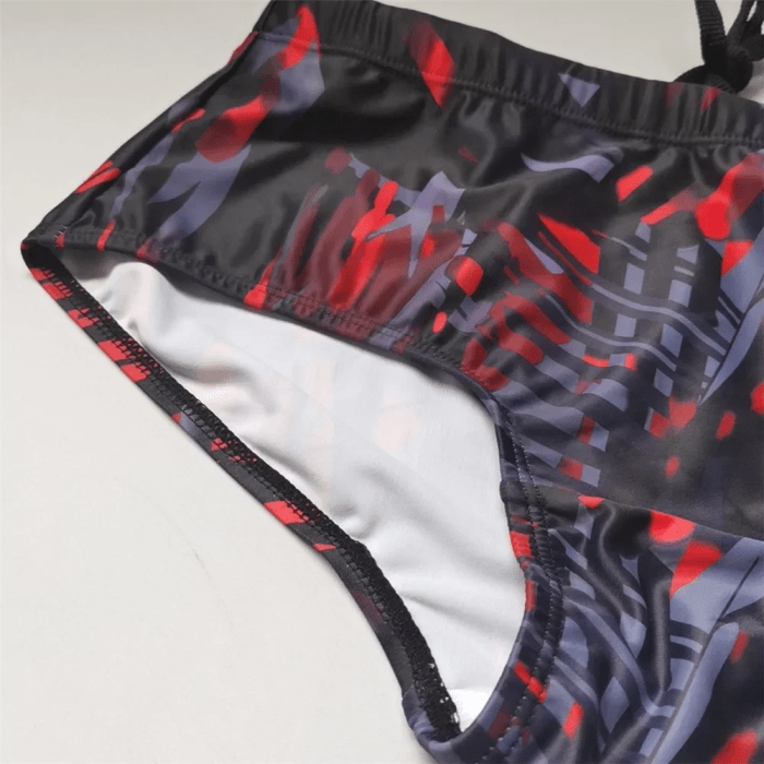 Close-up of men's Brazilian camouflage swim trunks showing breathable lightweight quick-dry material.