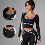 Women’s black long-sleeve crop top and high-waisted leggings set with white contrast trim