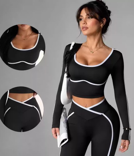 Women’s black long-sleeve crop top and high-waisted leggings set with white contrast trim