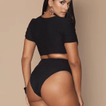 Women's black plus size monokini swimsuit with front zipper, short sleeves and quick-dry stretch fabric.
