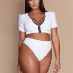 Women's white plus size monokini swimsuit featuring front zip, V-neck design and quick-dry comfort.