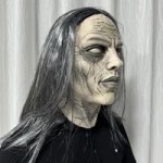 Profile view of realistic witch mask with cracked face detail